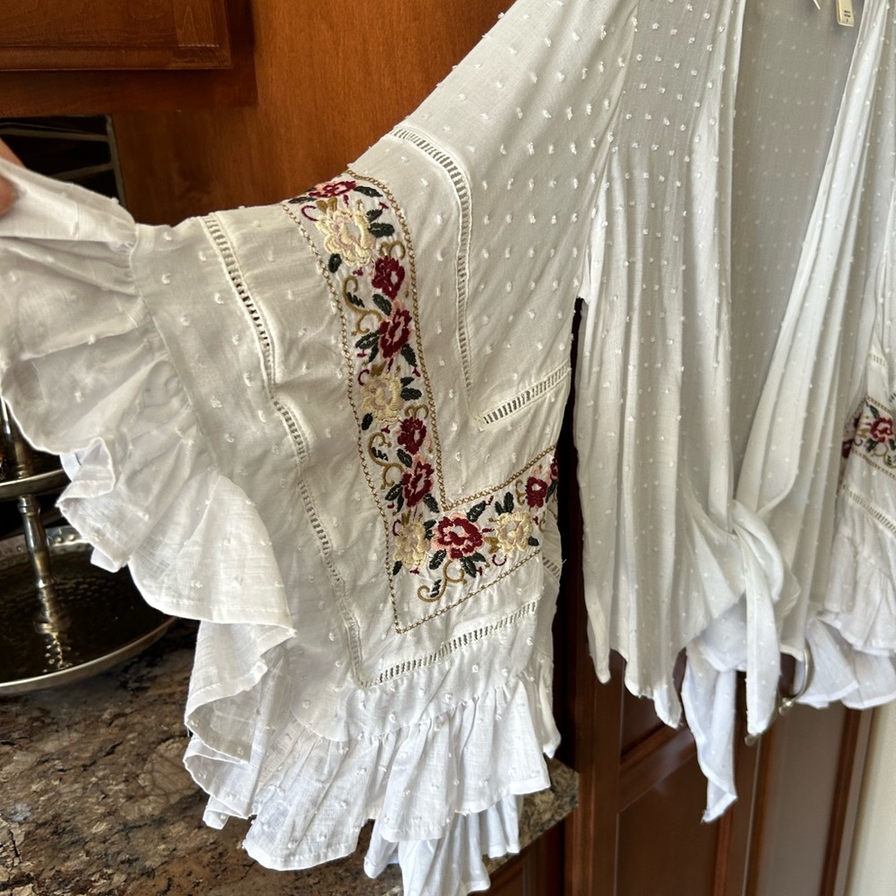 Daytrip topper with ruffled embroidered bell sleeves